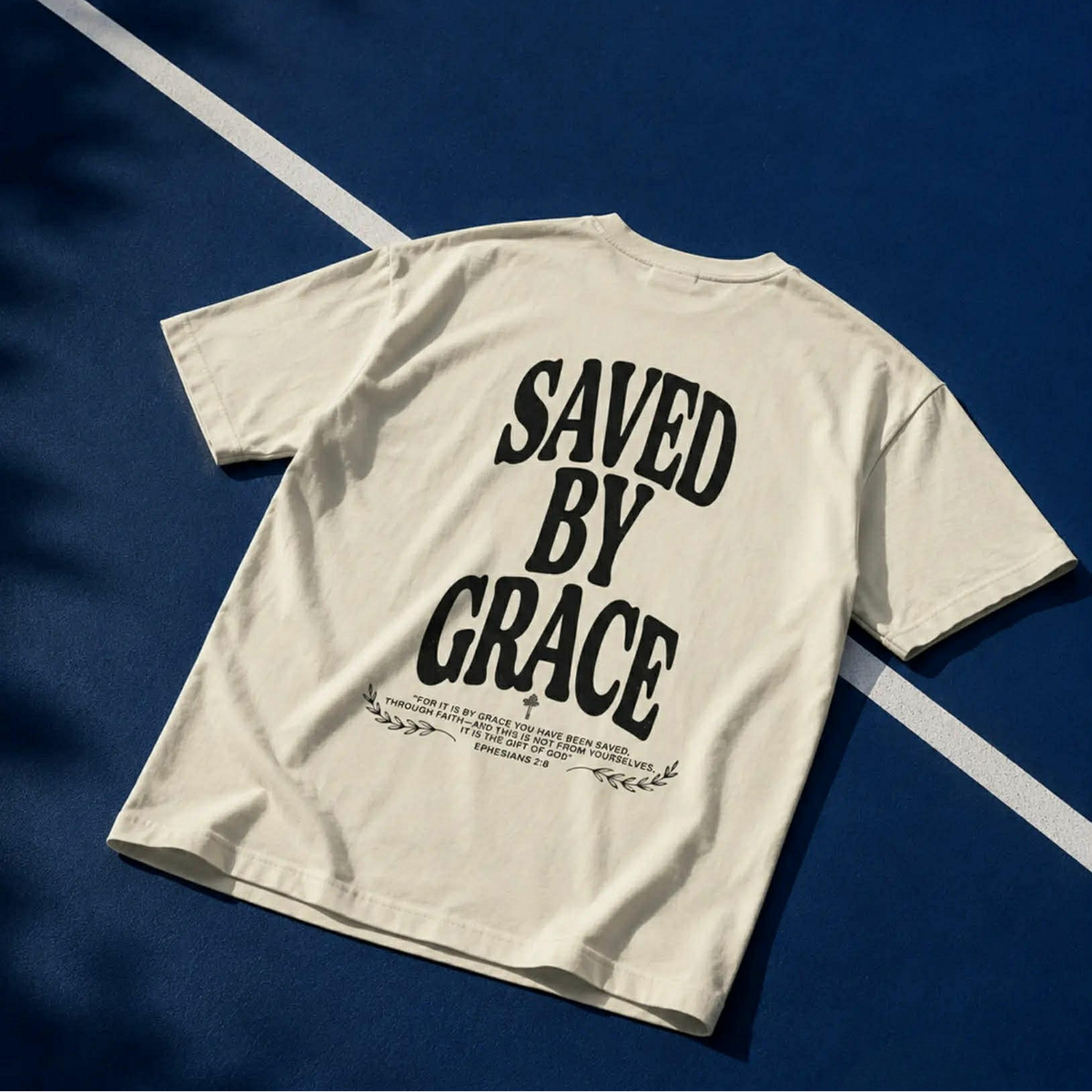 Saved by Grace Unisex Christian T-Shirt | GV Gold Monogram Collection Ephesians 2:8 Bible Verse Faith Streetwear Apparel
